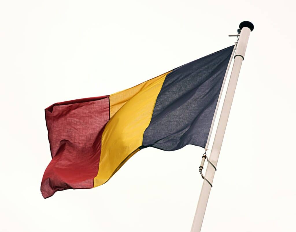 The Flag Of Belgium. Shot Of The Belgian Flag Blowing In The Wind.