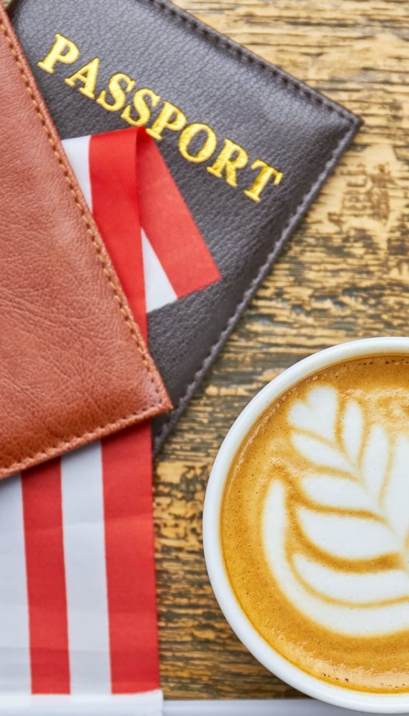 Coffee, Passports And Us Flag, Uae Golden Visa Agency, Singapore Citizenship Agency